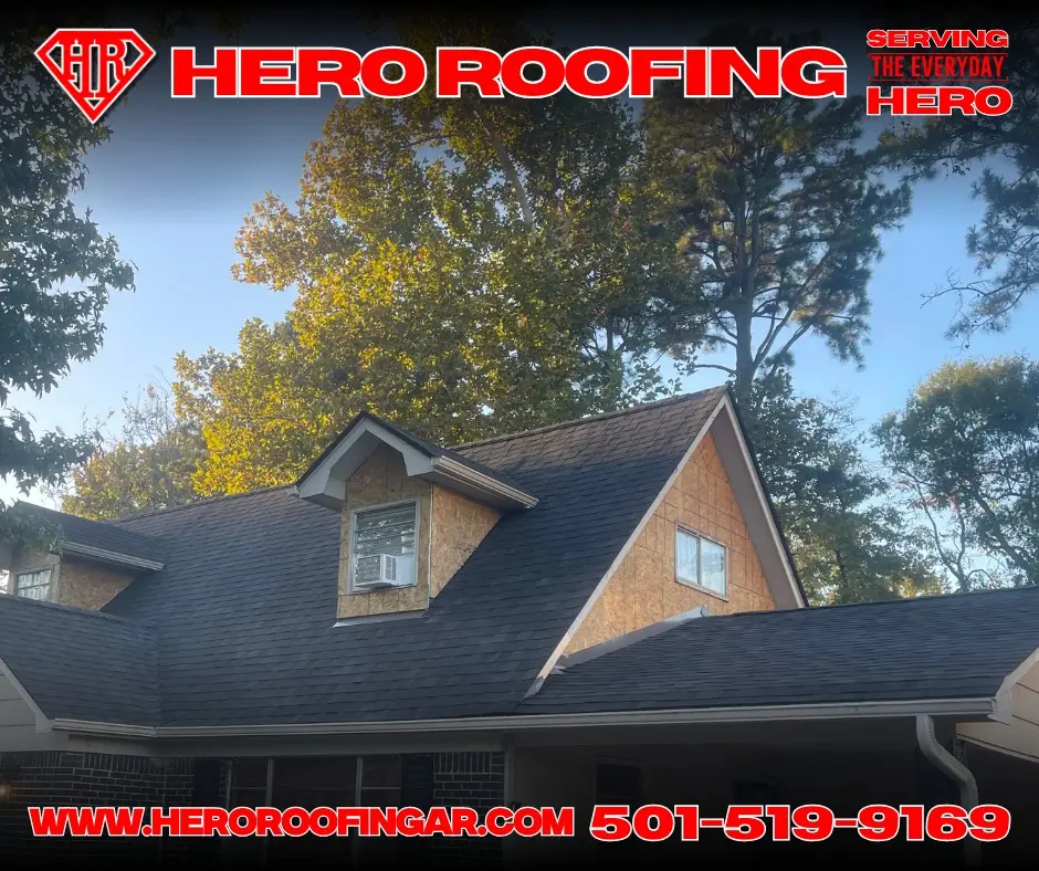 Completed dark asphalt shingle roof on a house